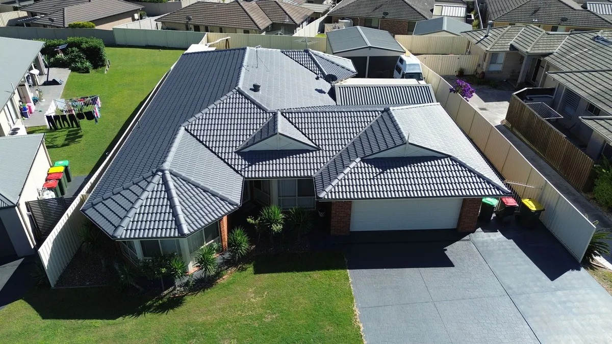 Aerial view of a charcoal tile roof repainted by Roof Restoration Masters in Cessnock