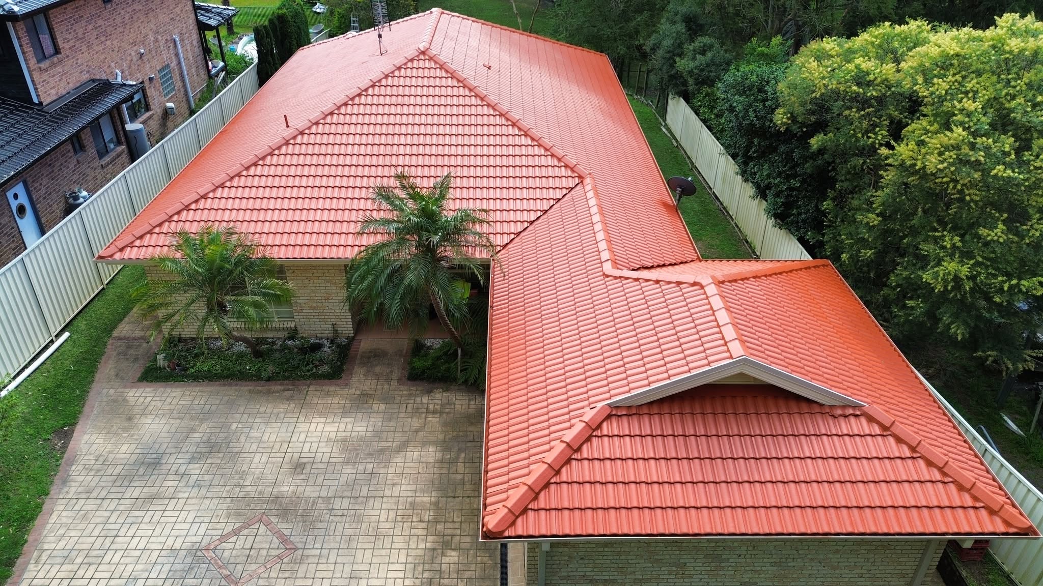 Aerial view of a terracotta tile roof after a full roof restoration in Newcastle