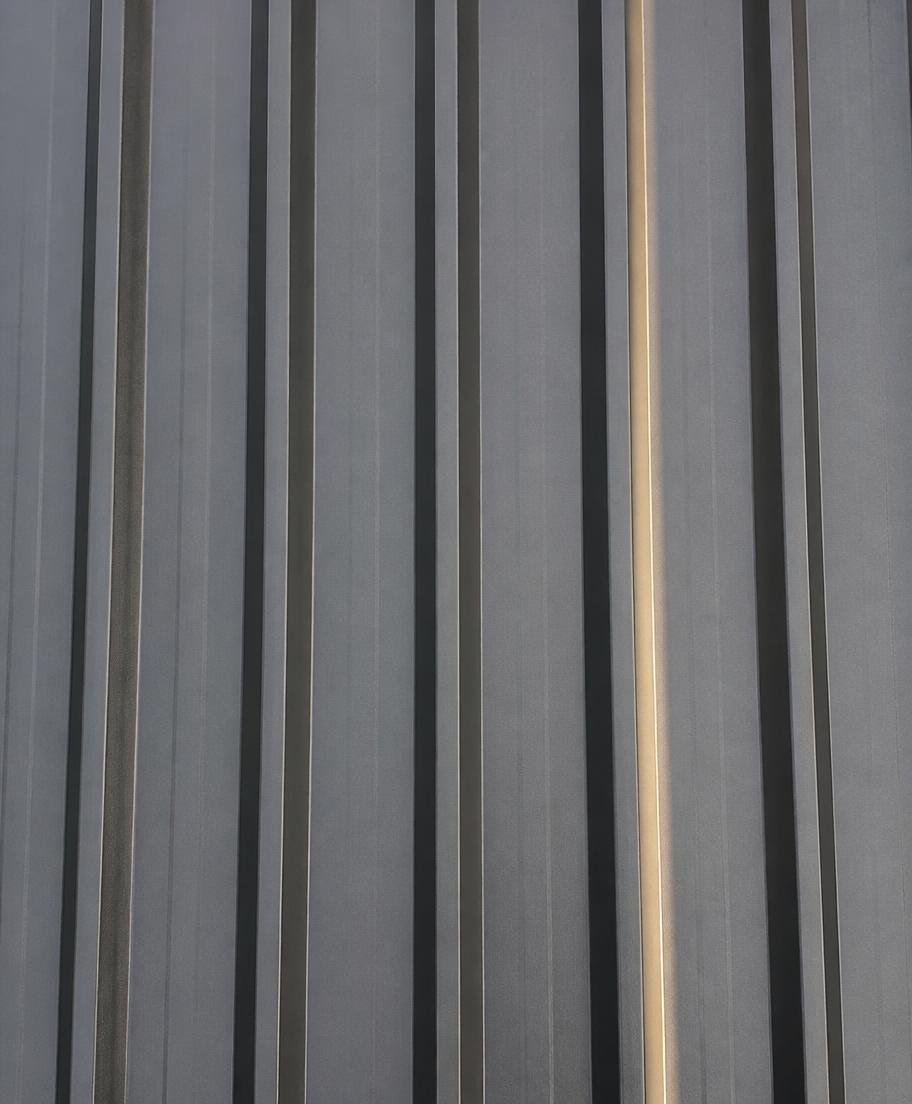 Overhead view of ribbed metal roof sheeting